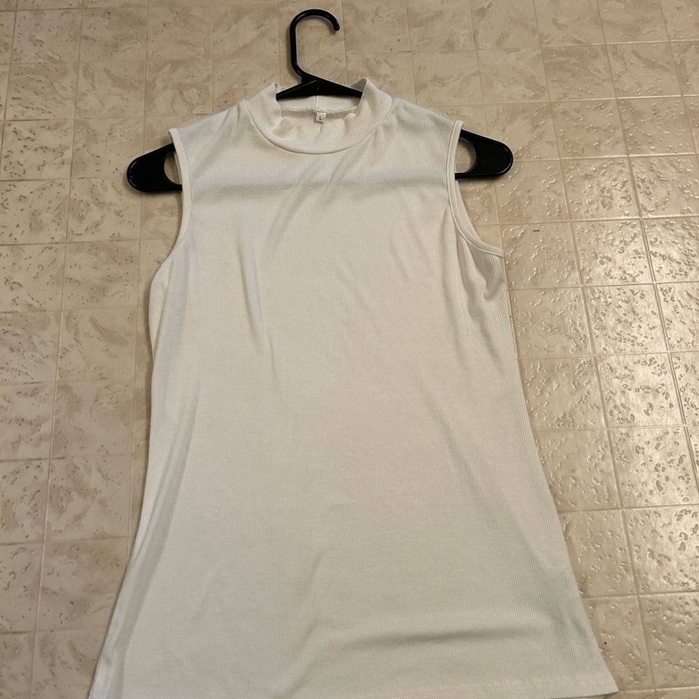 Sleeveless White Turtleneck